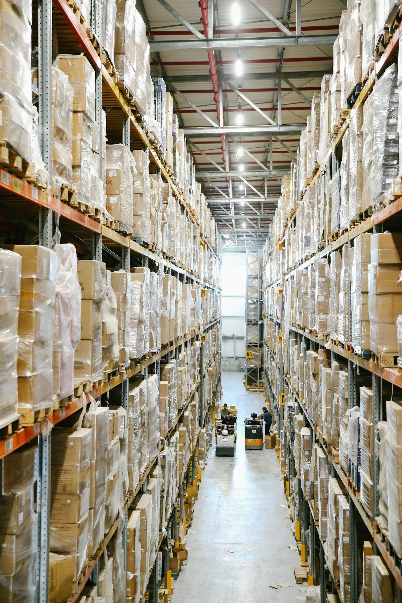 Tall warehouse aisles filled with boxes and fulfillment inventory.